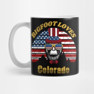 Bigfoot loves America and Colorado Mug